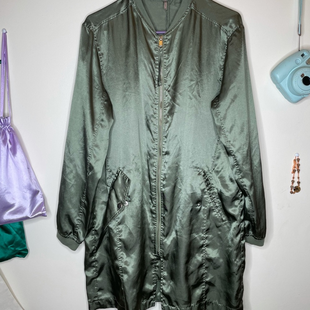 Medium sized satin green light jacket
